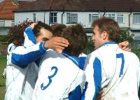 Brotherton, Negus and Riley celebrating the goal that won Enfield Town the first of two Essex Senior League championships.